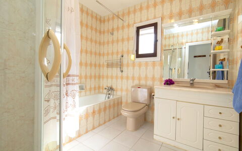 La Cigarra: Plumbing Fixture, Bathroom Cabinet, Mirror, Tap, Cabinetry, Toilet Seat, Bathroom Sink, Building, Bathroom, Wood