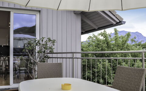 Bammer: Table, Property, Daytime, Furniture, Shade, Building, Sky, Chair, Plant, Interior Design