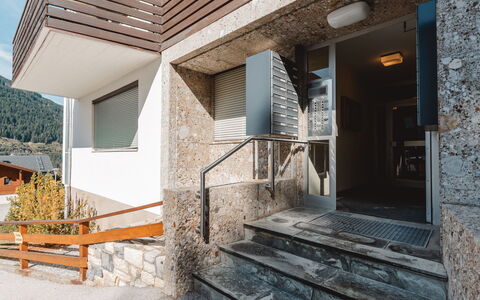 Martini: Property, Road Surface, Shade, Plant, Building, Wood, Facade, Stairs, Composite Material, Urban Design