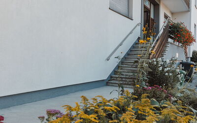 Bad Gastein 750: Plant, Flower, Building, Window, Property, Stairs, Leaf, Yellow, Door, Wall