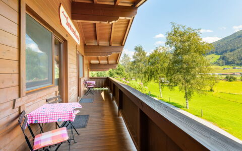 Haus am Sonnenhang: Property, Plant, Building, Wood, Shade, Window, Tree, Sunlight, Porch, Table