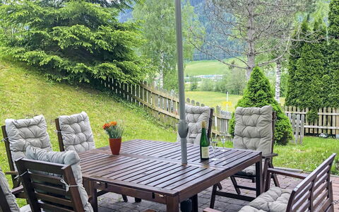 Haus am Sonnenhang: Plant, Table, Furniture, Property, Outdoor Table, Green, Botany, Nature, Chair, Building