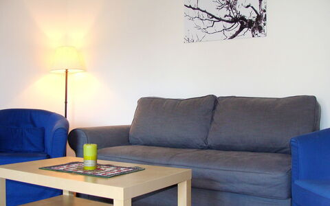 Seefeld in Tirol 202: Furniture, Room, Couch, Living Room, Table, Sofa Bed, Interior Design, Coffee Table, Yellow, Lighting