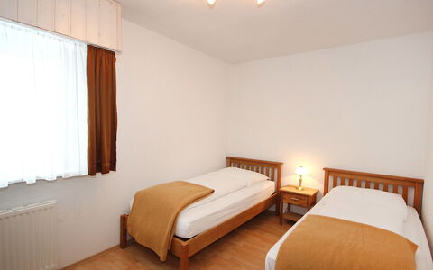 Seefeld in Tirol 100: Bedroom, Bed, Furniture, Room, Property, Bed Sheet, Bed Frame, Interior Design, Bedding, Wall