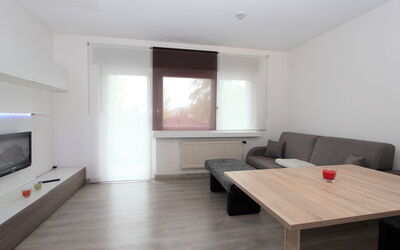 Am Birkenhain 100.30: Property, Furniture, Building, Table, Wood, Living Room, Lighting, Comfort, Interior Design