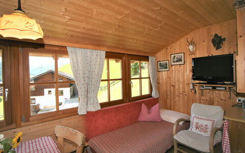 Chalet Antritt: Furniture, Property, Window, Wood, Architecture, Interior Design, Table, Comfort, Living Room, Hardwood