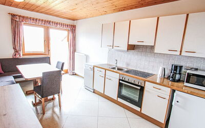 Voithofer 170.2: Cabinetry, Property, Countertop, Table, Window, Kitchen Stove, Kitchen, Wood, Interior Design, Kitchen Appliance