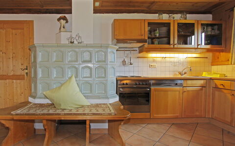 Auhäusl: Countertop, Room, Furniture, Kitchen, Cabinetry, Property, Kitchen Stove, Floor, Building, Tile