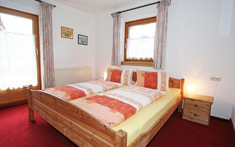 Mayrhofen 300: Bedroom, Bed, Furniture, Room, Property, Bed Sheet, Mattress, Bed Frame, Floor, Bedding
