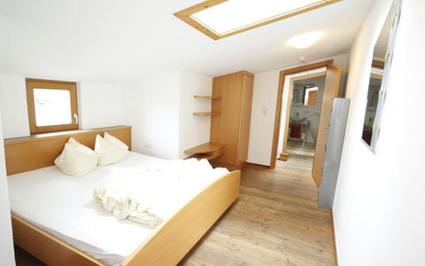 Längenfeld 100: Room, Property, Bedroom, Furniture, Interior Design, Bed, Ceiling, House, Building, Daylighting