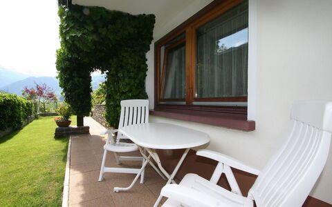 Pesjak: Property, House, Room, Furniture, Building, Real Estate, Table, Interior Design, Chair, Grass