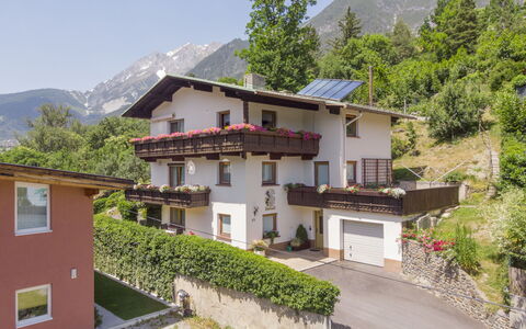 Pesjak: Plant, Building, Sky, Property, Mountain, Window, Tree, House, Land Lot, Urban Design
