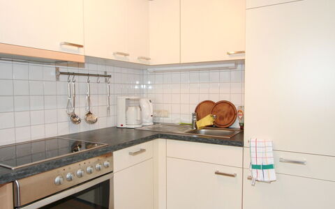 Schruns 25: Property, Room, Kitchen, Cabinetry, Furniture, Real Estate, Countertop, Interior Design, Building, House