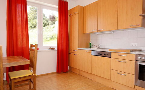 Carinthia: Room, Furniture, Property, Kitchen, Cabinetry, Interior Design, Building, Floor, House, Orange