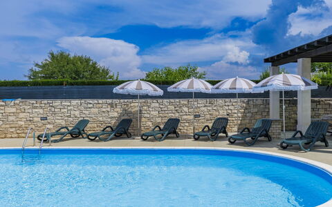 Villa Maran: Water, Cloud, Sky, Property, Blue, Swimming Pool, Building, Outdoor Furniture, Body Of Water, Tree