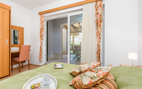 Ivana 2: Room, Furniture, Bedroom, Property, Interior Design, Bed, Orange, Wall, House, Table