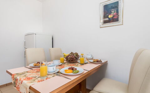 Rab Rab 316: Room, Furniture, Property, Table, Interior Design, Yellow, Dining Room, Wall, House, Building