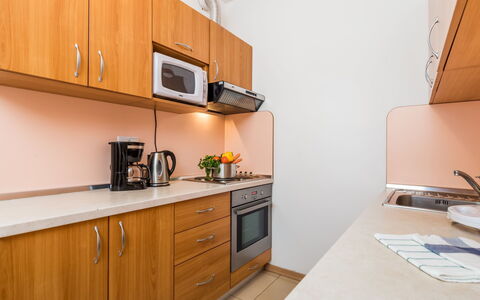 Rab Kampor 620: Countertop, Property, Cabinetry, Room, Kitchen, Furniture, Yellow, Interior Design, House, Building