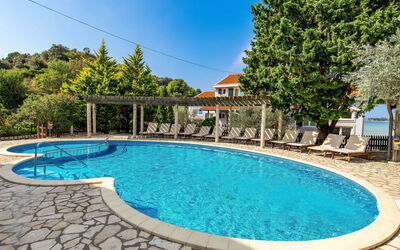 Rab Kampor 620: Water, Sky, Property, Swimming Pool, Blue, Azure, Plant, Tree, Building, Leisure