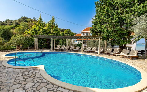 Lucija: Water, Sky, Property, Daytime, Swimming Pool, Blue, Azure, Tree, Plant, Building