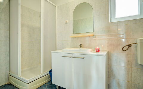 Pag Dinjiška 110: Bathroom, Room, Property, Tile, Floor, Tap, Interior Design, Wall, Plumbing Fixture, Architecture