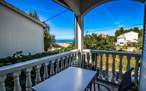 Starigrad-Paklenica 120: Sky, Property, Furniture, Table, Blue, Plant, Azure, Chair, Porch, Building