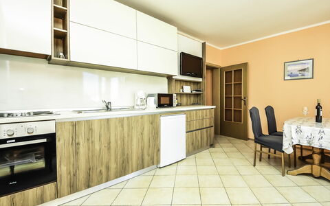 Starigrad-Paklenica 120: Cabinetry, Countertop, Furniture, Property, Kitchen, Kitchen Stove, Kitchen Appliance, Wood, Chair, Interior Design
