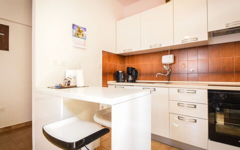 Marija: Cabinetry, Furniture, Countertop, Property, Sink, Tap, Building, Kitchen Appliance, Kitchen Stove, Wood