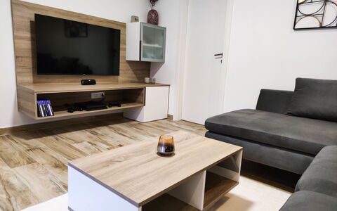 Milka: Couch, Picture Frame, Table, Furniture, Property, Wood, Cabinetry, Living Room, Comfort, Interior Design