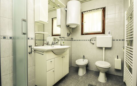 Marija: Property, Sink, Toilet Seat, Bathroom Sink, Purple, Toilet, Bathroom, Building, Plumbing Fixture, Mirror