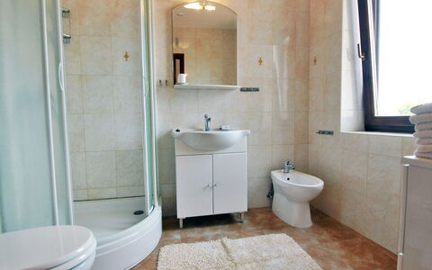 Mirta: Bathroom, Property, Room, Floor, Tile, Plumbing Fixture, Interior Design, Wall, Building, Bathroom Cabinet