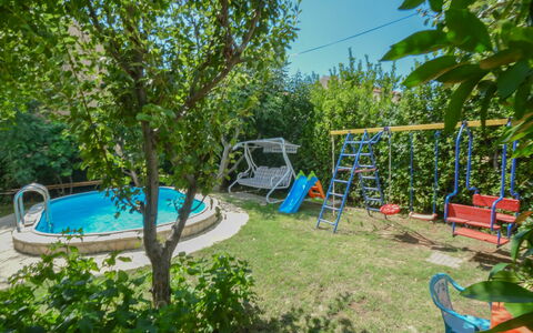 Mihovilka: Plant, Water, Sky, Green, Shade, Swimming Pool, Outdoor Furniture, Recreation, Landscape, Tree