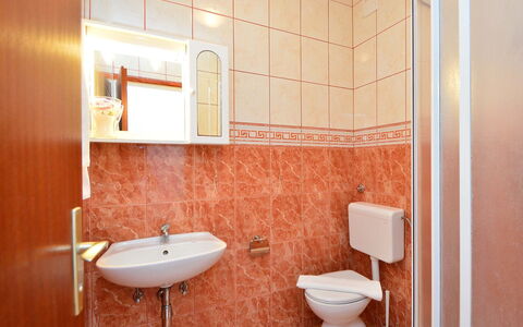 Rogoznica Ražanj 510: Bathroom, Property, Room, Interior Design, Wall, Plumbing Fixture, Tile, Orange, Architecture, Toilet