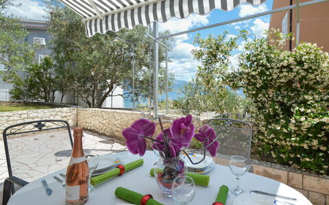 Trogir Slatine 165: Table, Plant, Tableware, Furniture, Property, Stemware, Chair, Sky, Tablecloth, Drinkware