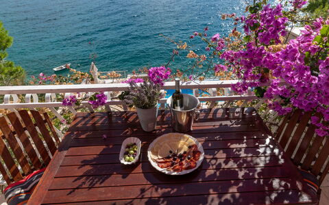 Trogir Okrug Gornji 320: Water, Flower, Table, Plant, Furniture, Tableware, Outdoor Table, Chair, Outdoor Furniture, Lighting