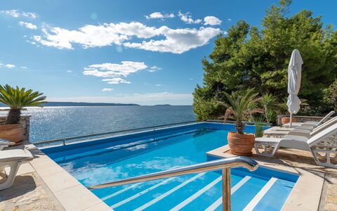 Trogir Okrug Gornji 320: Water, Sky, Cloud, Plant, Property, Swimming Pool, Building, Azure, Tree, Outdoor Furniture