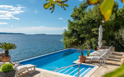 Trogir Okrug Gornji 320: Water, Plant, Cloud, Sky, Property, Azure, Nature, Swimming Pool, Shade, Outdoor Furniture