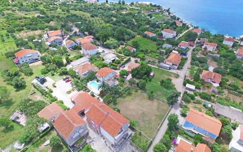 Balota: Water, Property, Building, Plant, House, Vegetation, Tree, Urban Design, Land Lot, Natural Landscape