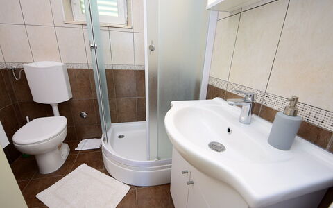 Katica: Bathroom, Property, Toilet, Room, Plumbing Fixture, Wall, Toilet Seat, Floor, Tile, Interior Design