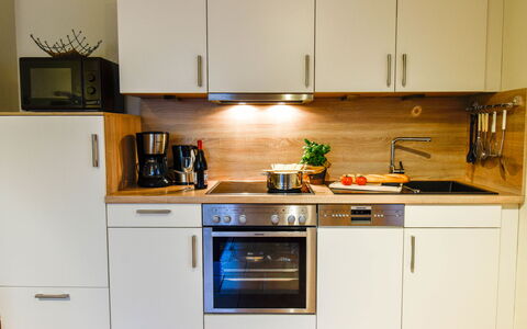 Norddeich 380: Cabinetry, Property, Countertop, Kitchen Appliance, Kitchen Stove, Kitchen, Home Appliance, Wood, Interior Design, Flooring