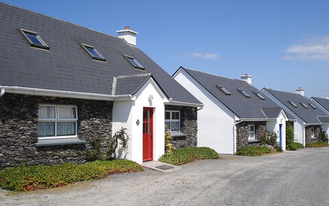 Portmagee Knightstown 100: Plant, Building, Sky, Window, Cloud, House, Slope, Land Lot, Door