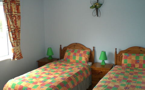 Glenvale Cottage: Bedroom, Room, Bed, Furniture, Property, Bed Sheet, Green, Wall, Interior Design, Bedding