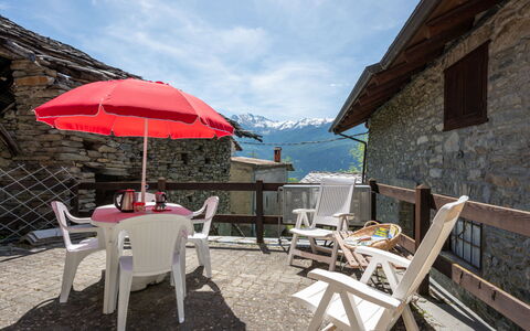 Remondet 20: Cloud, Sky, Furniture, Property, Table, Chair, Shade, Outdoor Table, Building, Outdoor Furniture