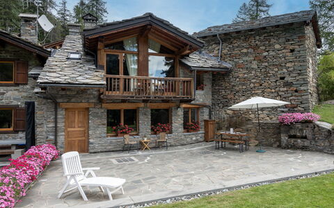 Chez les Roset: Plant, Sky, Building, Window, Table, Cloud, Tree, Chair, House, Outdoor Furniture
