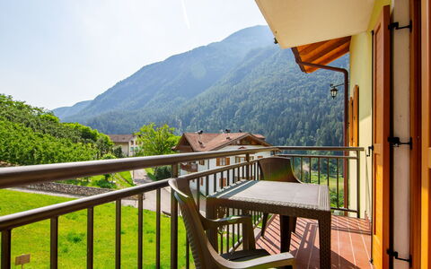 Malè 200: Sky, Property, Building, Wood, Tree, Interior Design, Mountain, Fence, Plant, Porch