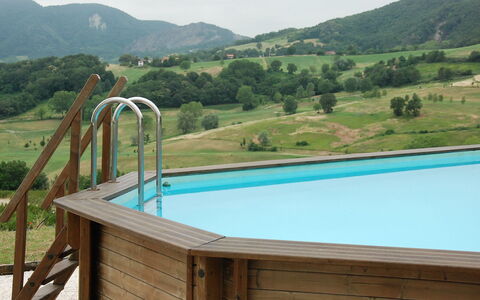 Busani: Swimming Pool, Property, Leisure, Water, Vacation, Resort, Real Estate, House, Landscape, Wood