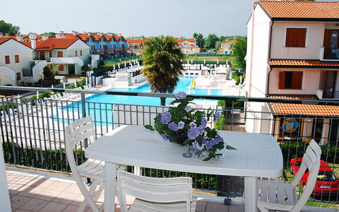Rosolina Mare 300: Sky, Window, Plant, Table, Azure, Building, Outdoor Furniture, Urban Design, Shade, Residential Area