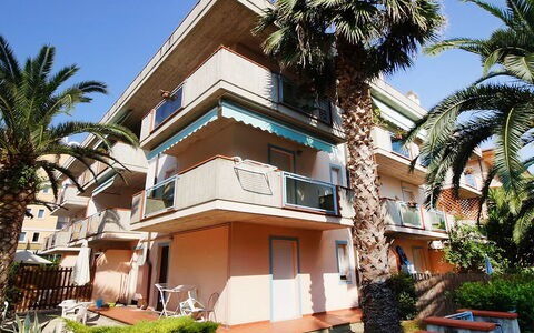 Troiani: Sky, Plant, Building, Window, Tree, Azure, House, Arecales, Facade, Real Estate