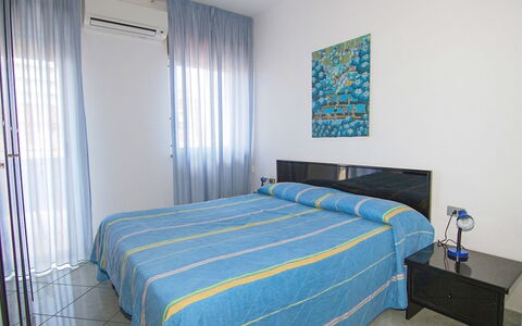 Azzurra: Bedroom, Room, Bed, Bed Sheet, Property, Furniture, Blue, Wall, Interior Design, Mattress