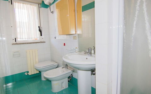 Azzurra: Bathroom, Property, Room, Plumbing Fixture, Purple, Wall, Sink, Toilet, Bathroom Sink, Interior Design